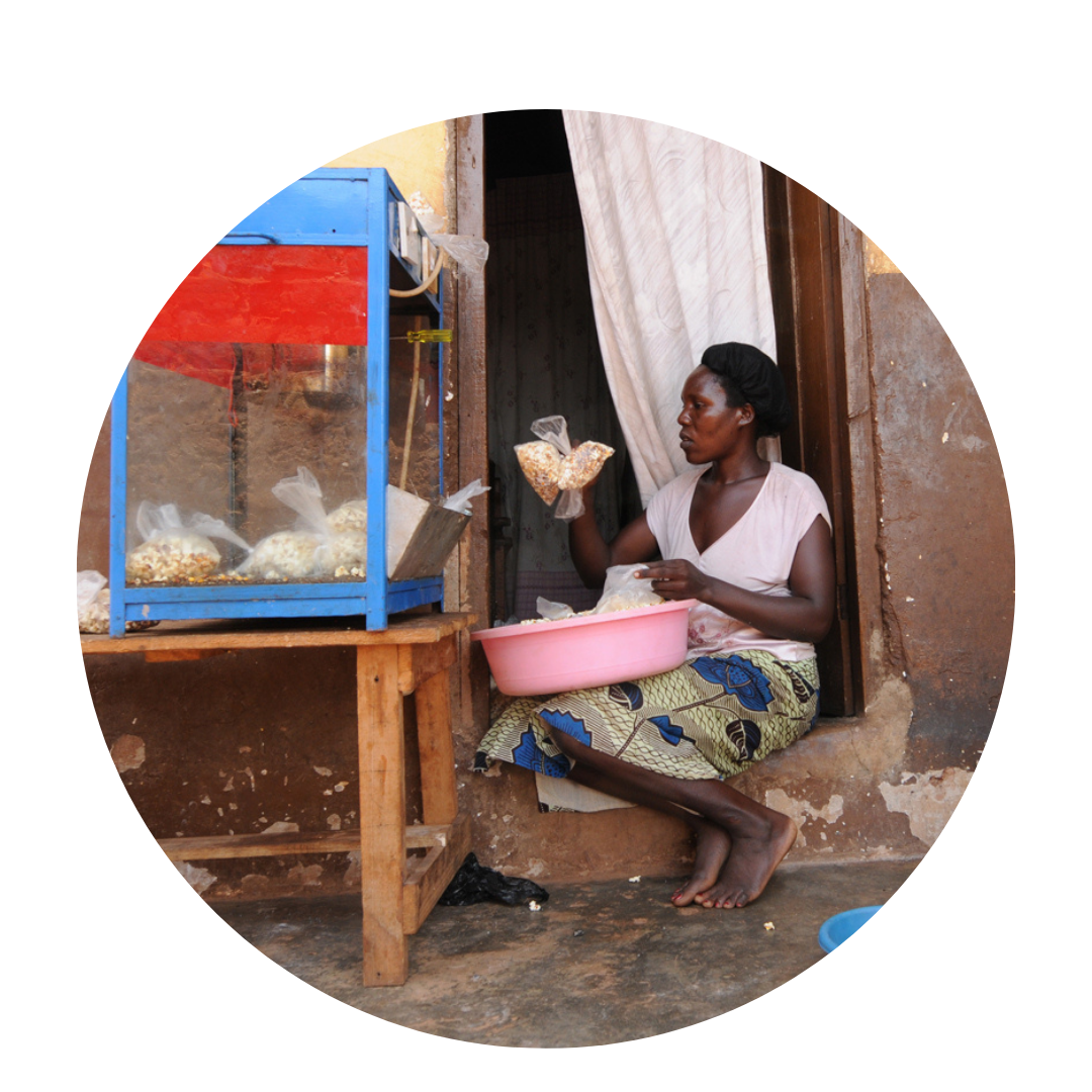 Ugandan woman making popcorn to sell