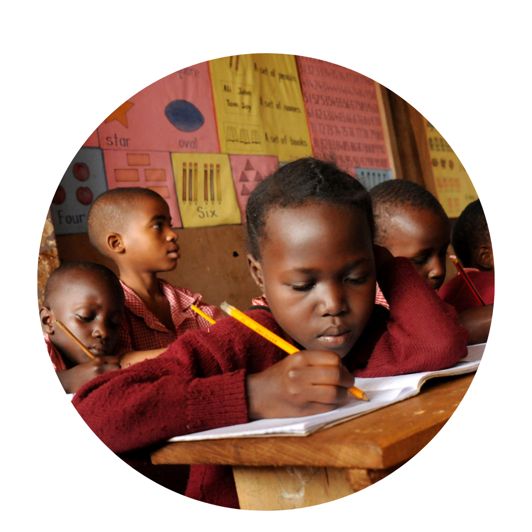 Young Ugandan girl studying in school